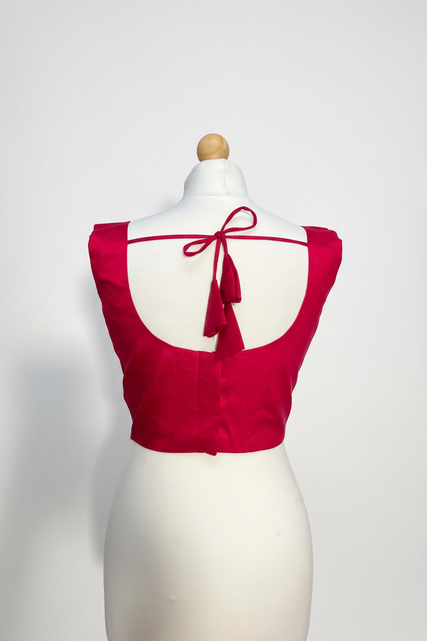 Stretchable Readymade Blouse with a tie-back design.