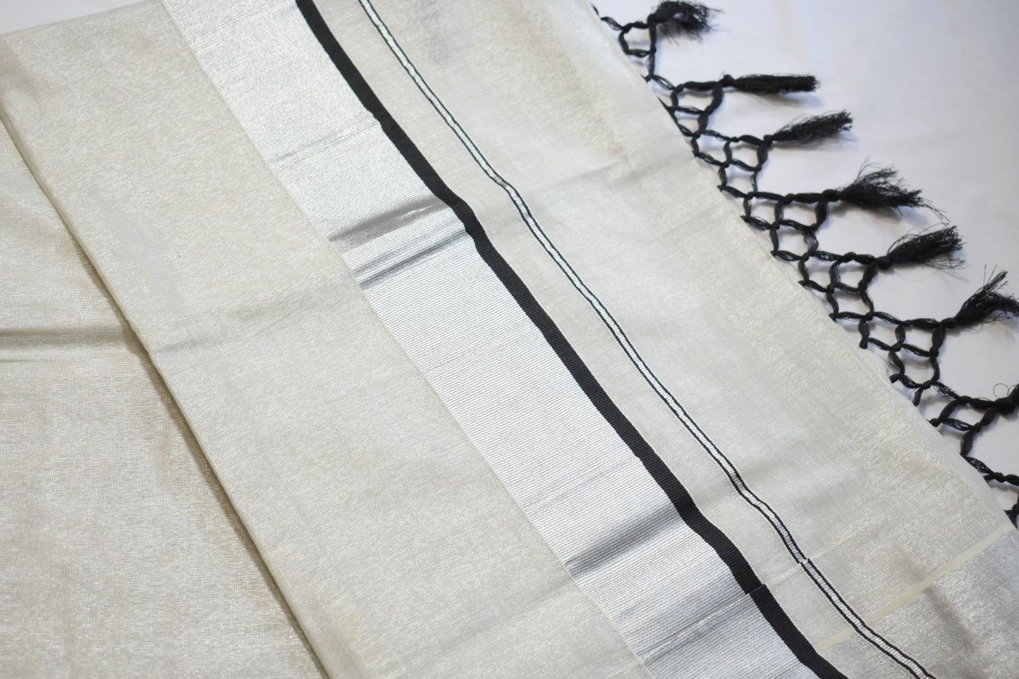 Silver & Black Stripe Tissue Onam Set Saree with Tassels
