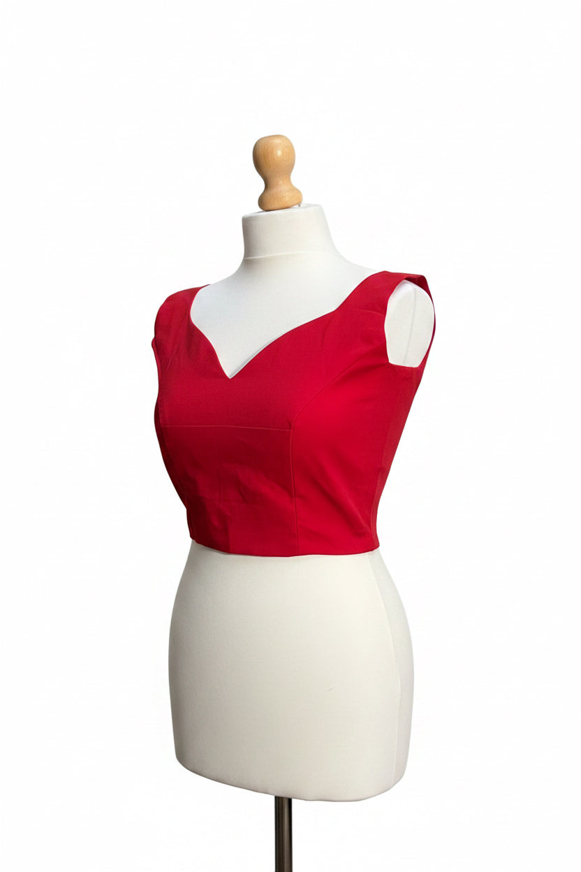 Stretchable Readymade Blouse with a tie-back design.