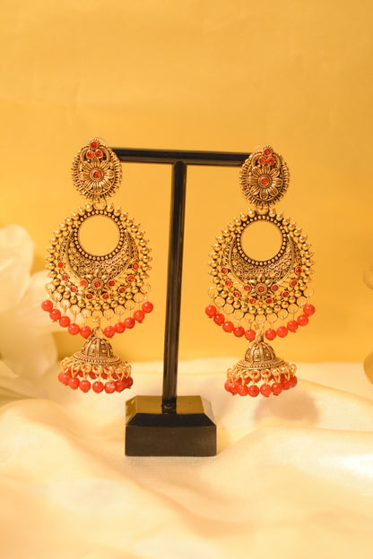 Gold-Tone Jhumka Earrings with Red Detailing