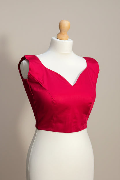 Stretchable Readymade Blouse with a tie-back design.