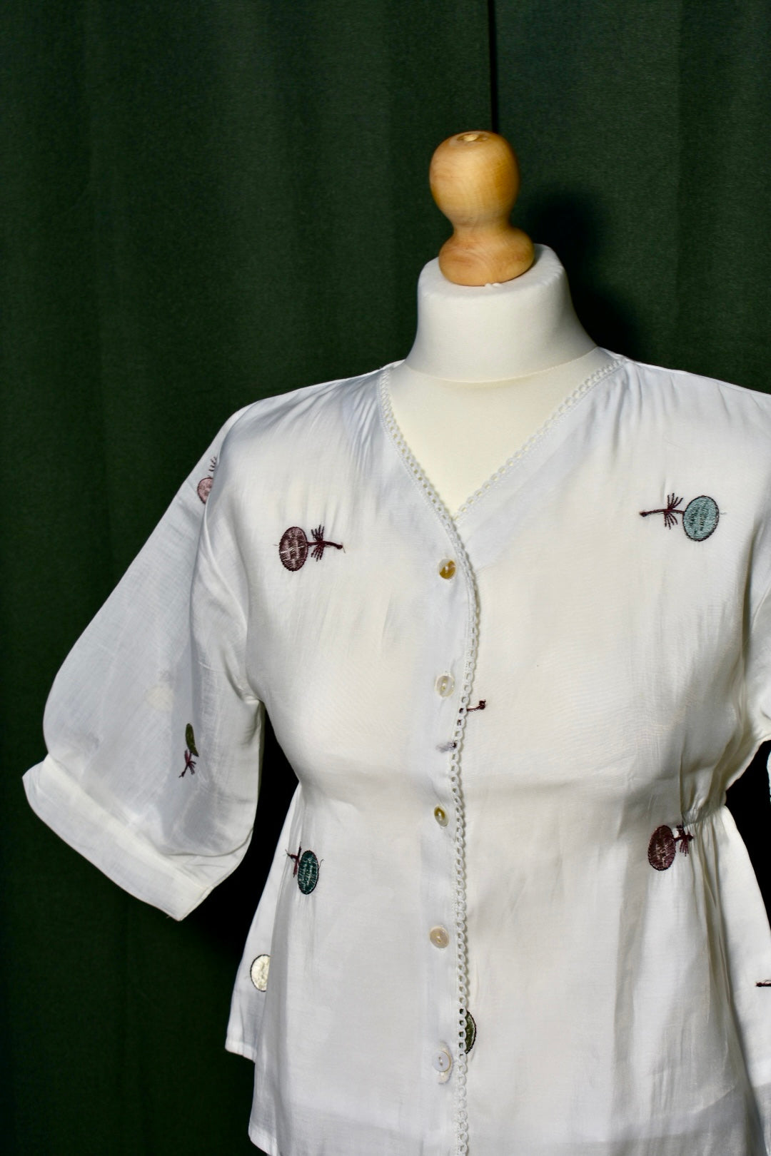 White Floral Embroidered Button-Down Top with Elastic Sides