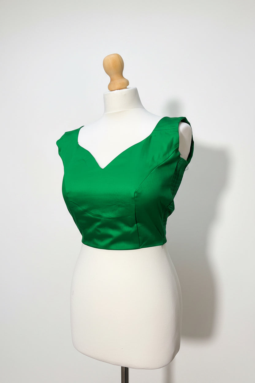 Stretchable Readymade Blouse with a tie-back design.