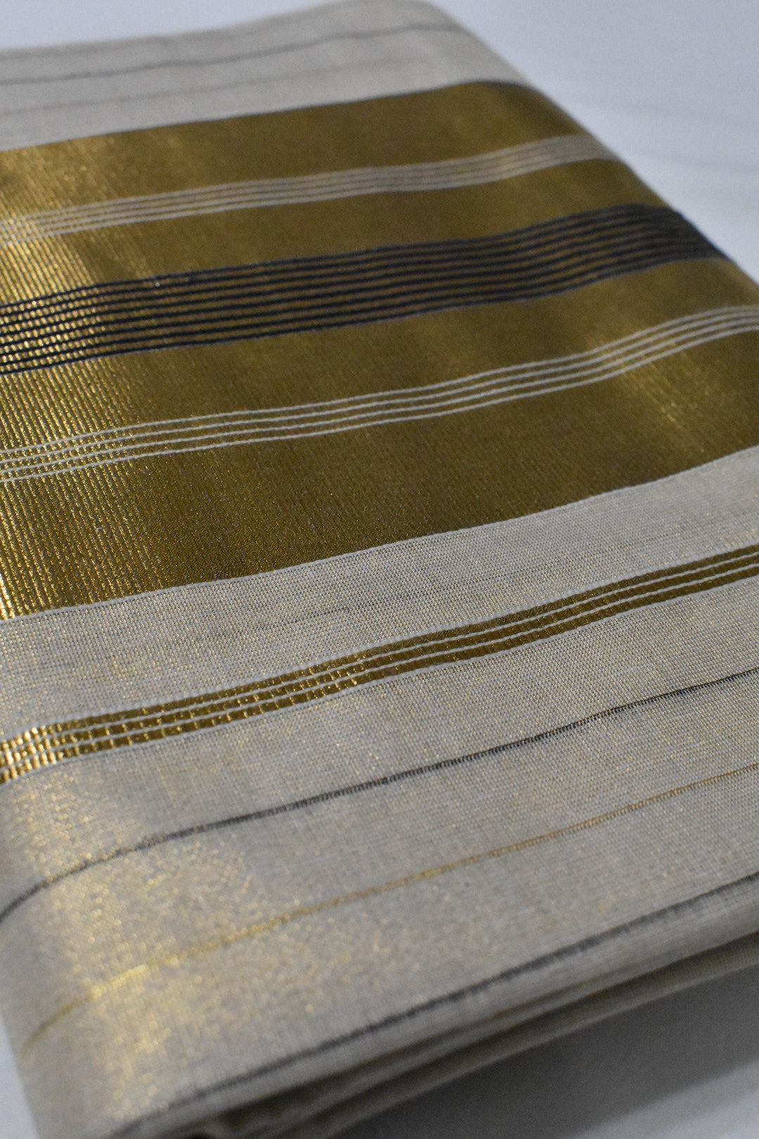 Black with Gold Stripe Onam Tissue Set Saree