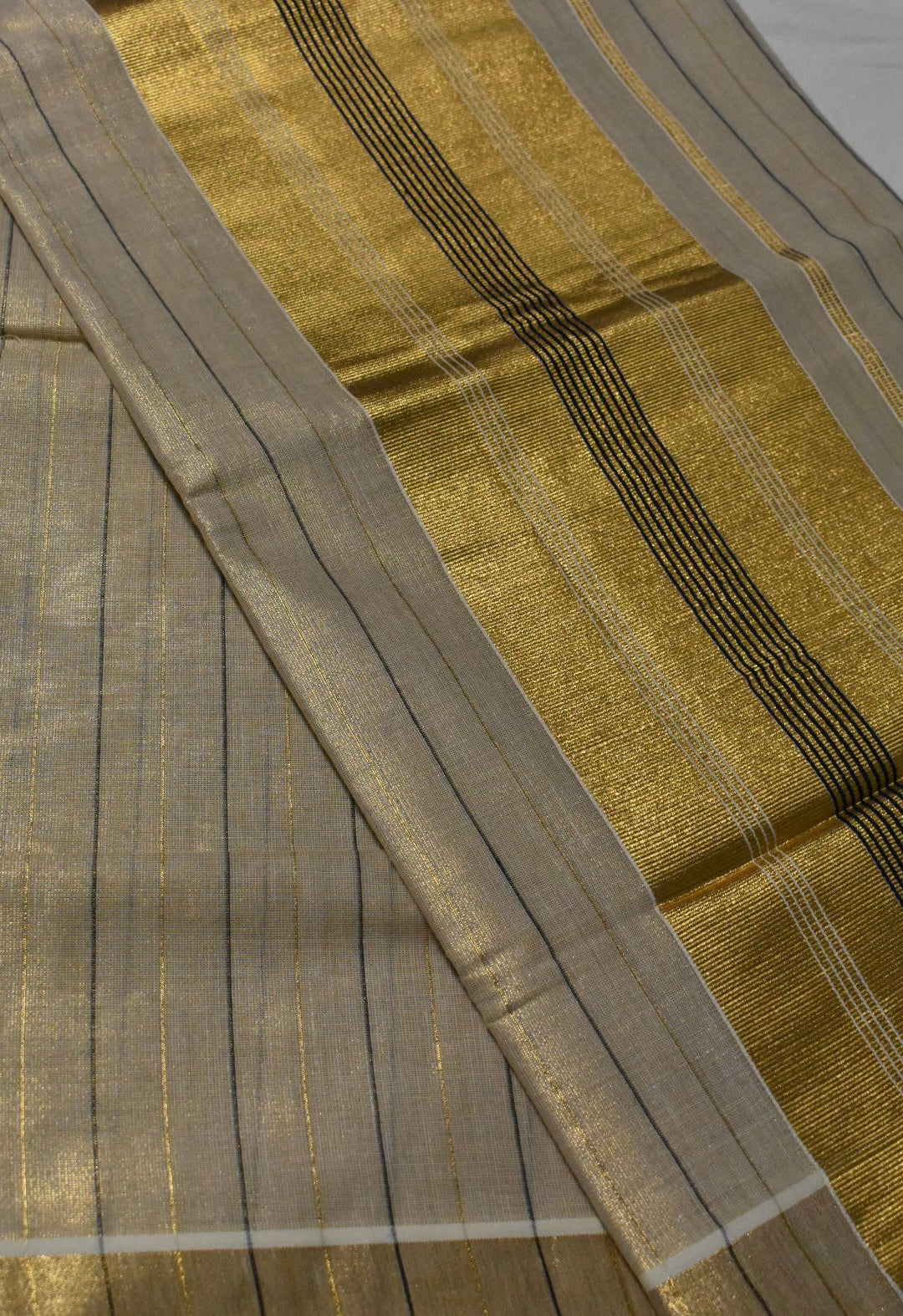 Black with Gold Stripe Onam Tissue Set Saree