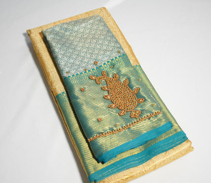 Gold Fancy Saree with Blue Handworked Statement Blouse