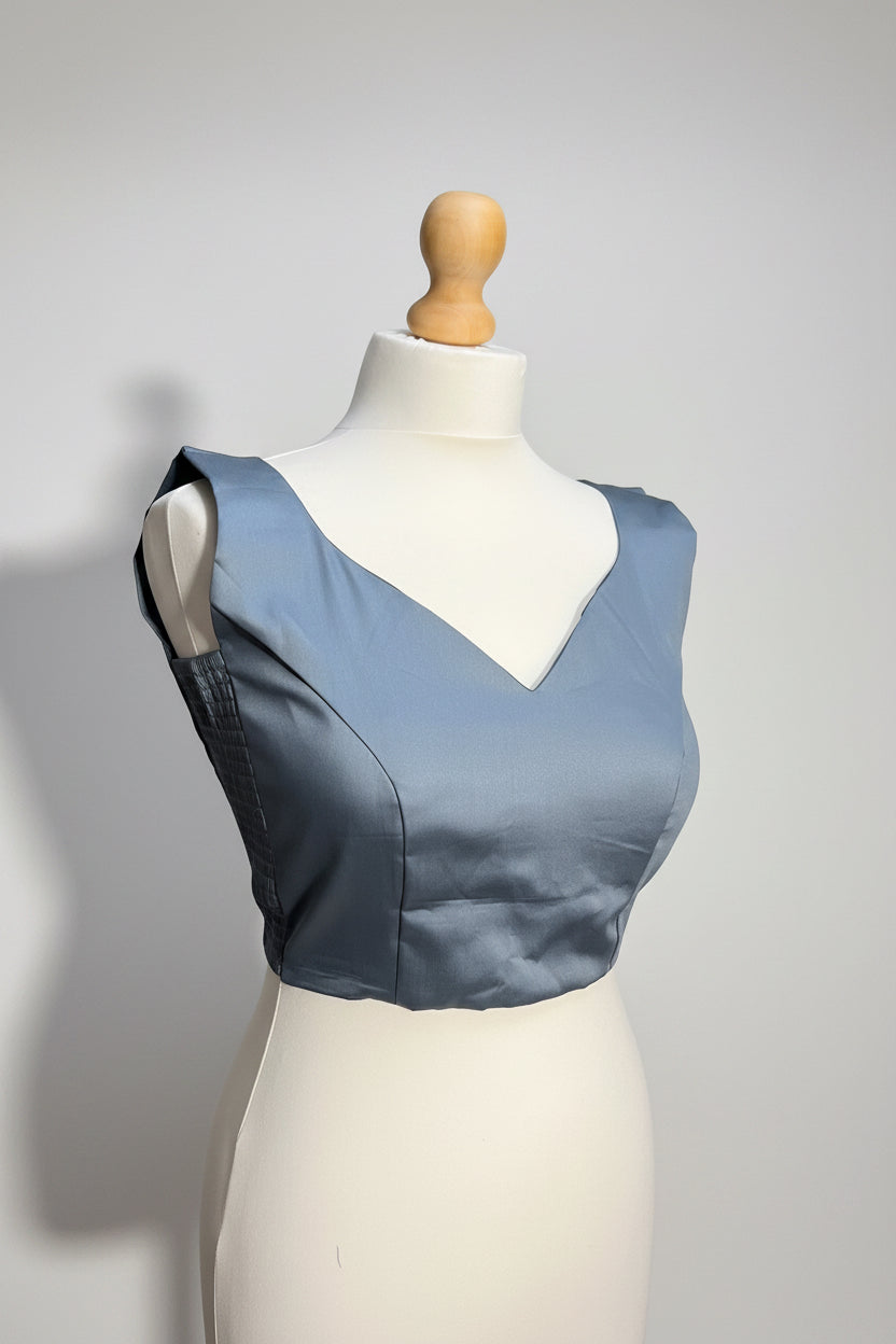 Stretchable Readymade Blouse with a tie-back design.