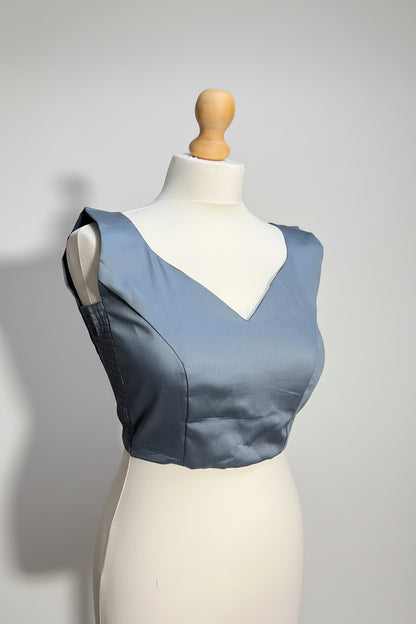 Stretchable Readymade Blouse with a tie-back design.